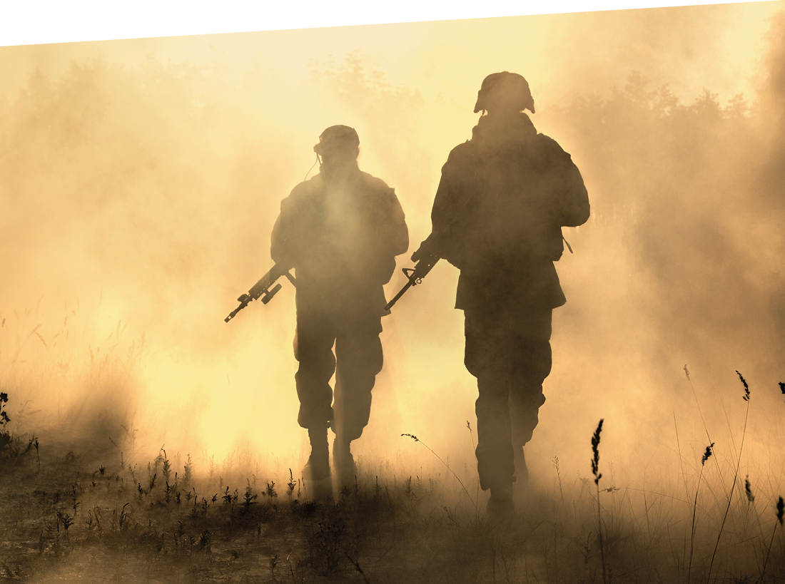 United States Marines in action. Military equipment, army helmet, warpaint, smoked dirty face, tactical gloves. Military action, desert battlefield, smoke grenades