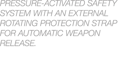 PRESSURE ACTIVATED SAFETY SYSTEM WITH AN EXTERNAL ROTATING PROTECTION STRAP FOR AUTOMATIC WEAPON RELEASE.